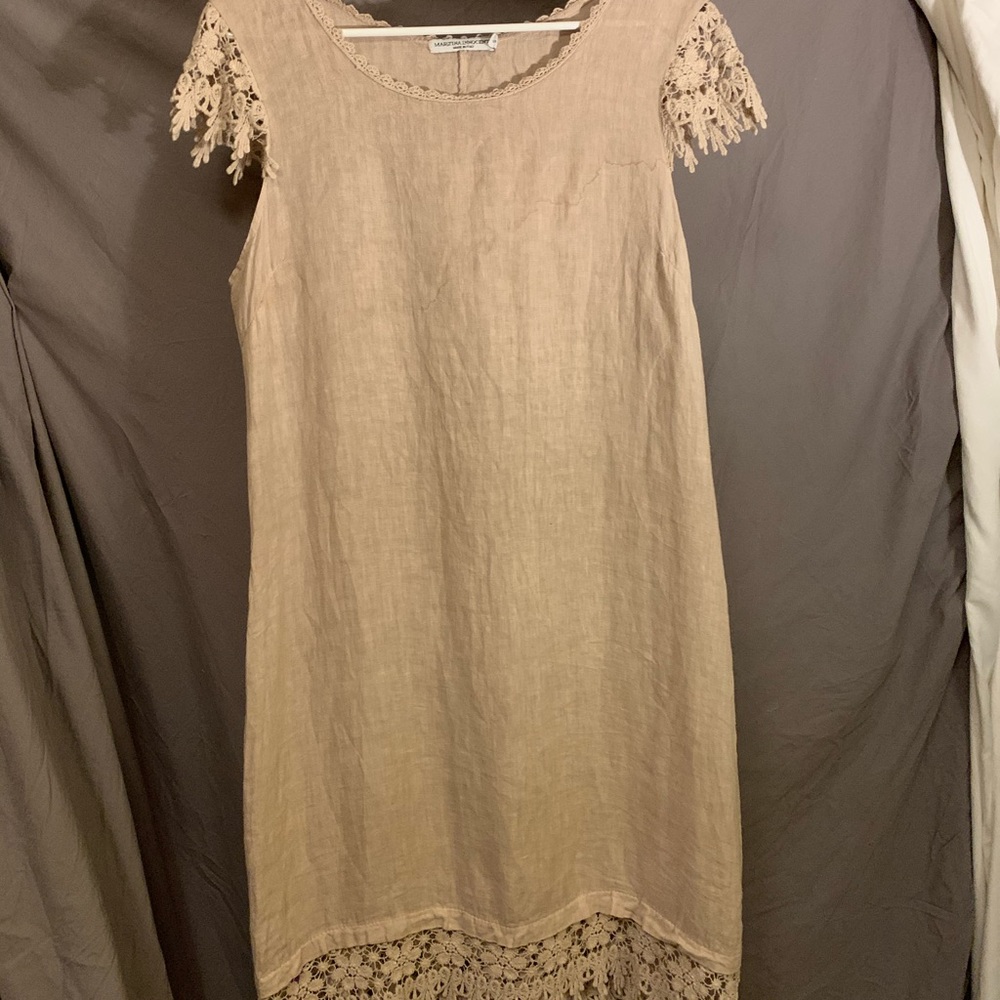 Martina Innocenti linen dress. Cricket detail on shoulders and bottom hem.